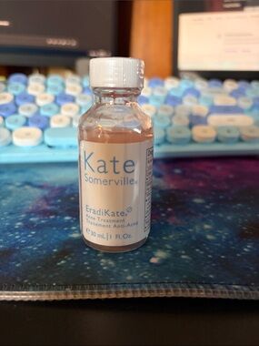 Kate Somerville EradiKate Acne Treatment - peach beige bottle